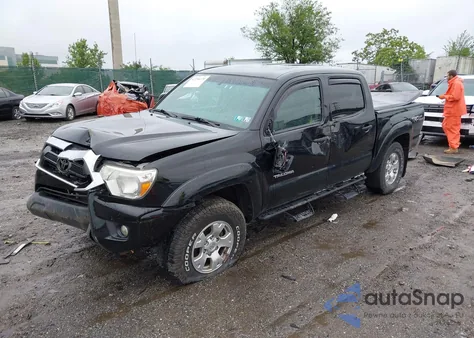2015 Toyota Tacoma Base V6 z USA, uszkodzony, nr VIN 3TMLU4EN2FM180066
